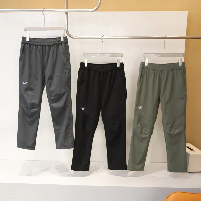 AR*TERYX TRACK PANTS
